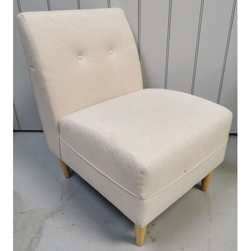 959 - A pair of cream fabric, cushioned, low set chairs. Dimensions(cm) H75(40 to seat), W50, D65.