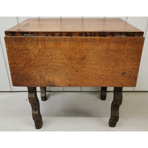 972 - An antique oak, single drop-leaf table, with wavy legs. Dimensions(cm) H64, W67/43, D65.