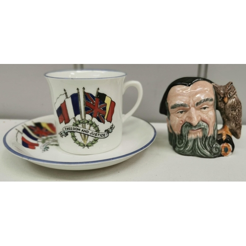 1360 - A selection of five ceramic items. To include a 'Royal Doulton - Merlin' mini cup, a Royal Coleston ... 