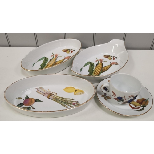 1394 - A selection of ten  pieces of Royal Worcester tableware. 'Evesham' range - three serving dishes, cup... 