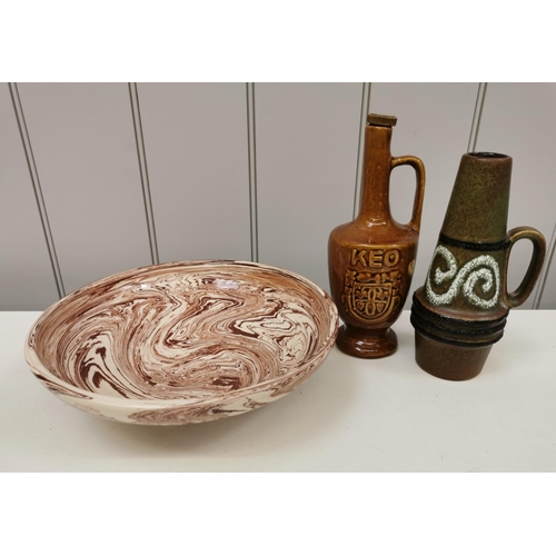 1366 - A collection of three pottery pieces. To include a swirl-patterned bowl & empty liqueur vessels. Tal... 