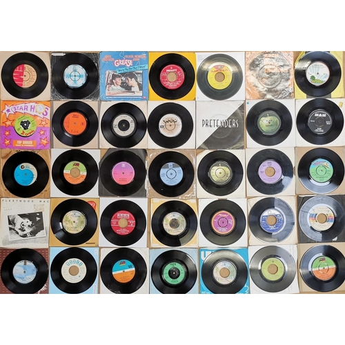 3684 - A collection of sixty-nine 1970's vinyl singles. To include fifteen without sleeves.