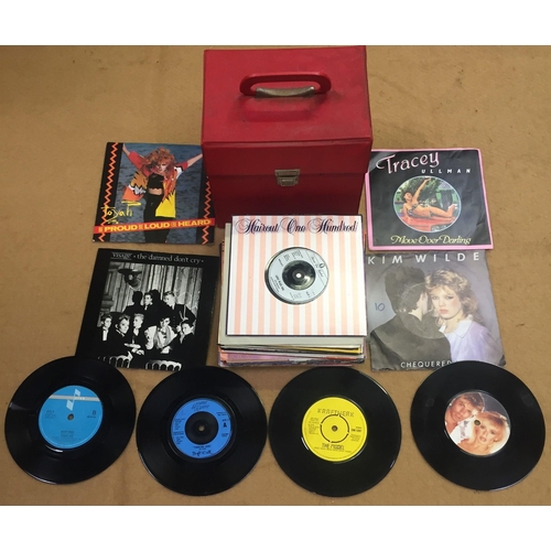 3732 - A collection of approximately forty-five 1980's vinyl singles. Together with a well-used carry case.