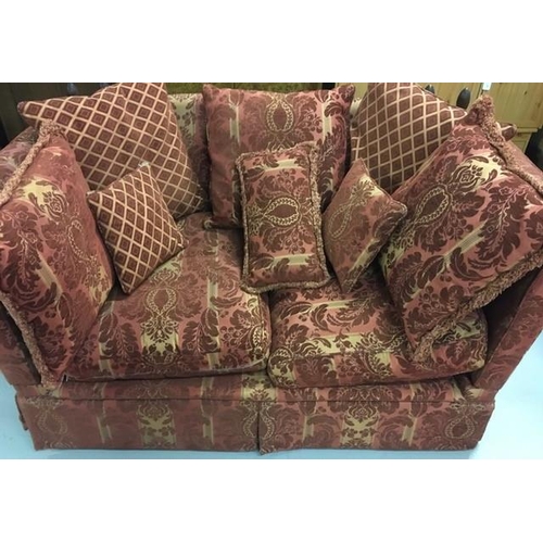 135 - A two-seater knole sofa, upholstered in burgundy & cream paisley fabric, together with complimenting... 