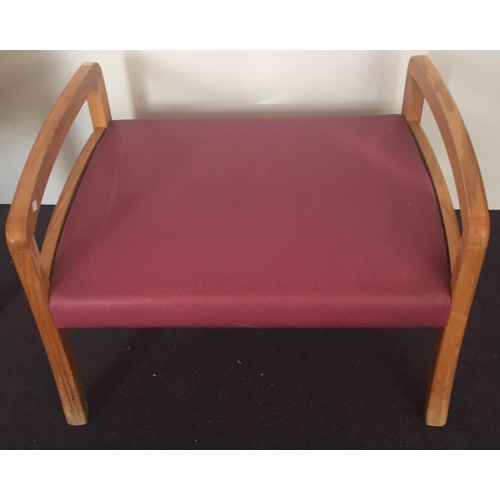 138 - A Parker Knoll mauve coloured tub chair (model P.K. 1184-7) with matching footstool (model P.K. 1240... 