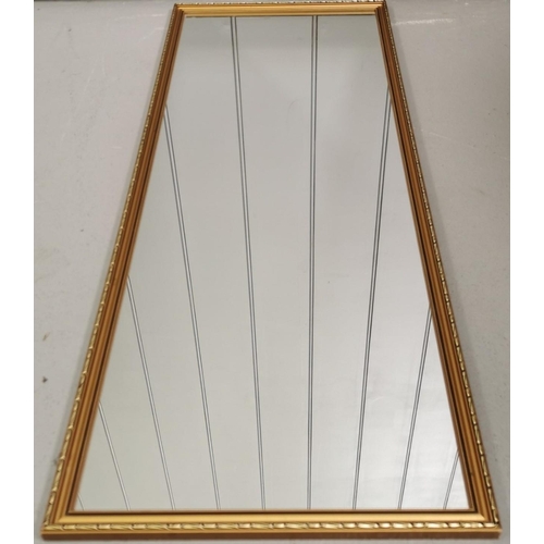 183 - A rectangular full length wall mirror, with wooden, gold-coloured, filigree-effect frame.  Height 92... 