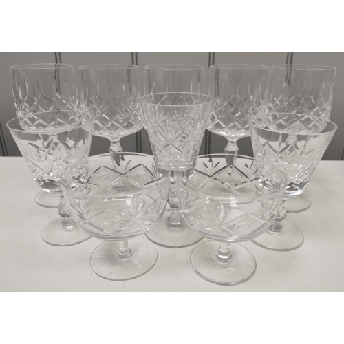 201 - A selection of fifty-eight items of mixed glassware. To include crystal & branded examples.