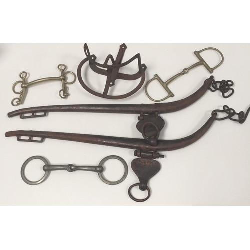 463 - A pair of antique horse hames, together with vintage stirrups etc.