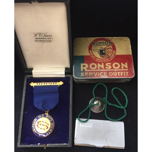 482 - A vintage Secretary medallion for the 'Unafraid Old Boys Society' together with a 'Ronson' service o... 