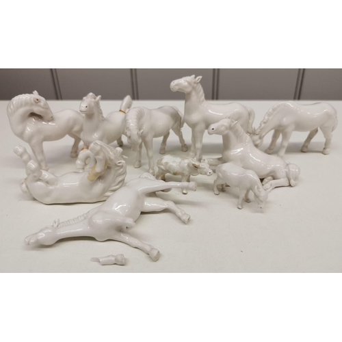 524 - A collection of eight white porcelain horses & two Oxen. Some damage to three horses & evidence of r... 