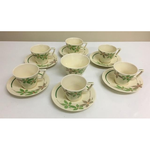 525 - A vintage, Wedgwood & Co  part-coffee service. Includes 6 cups, 6 saucers & sugar bowl.