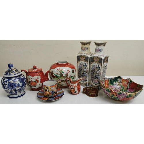 549 - A selection of ten, oriental-themed, decorative ceramics.