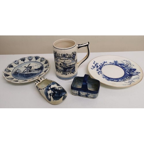 553 - A selection of five decorative Delft pieces.