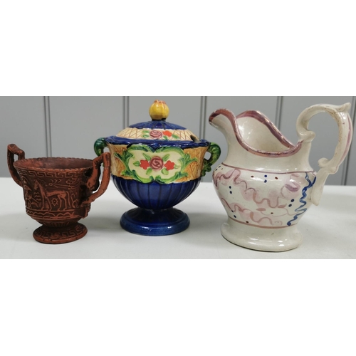 561 - A mixed lot of thirteen pieces of vintage, decorative ceramics & glassware. To include vases, jugs, ... 