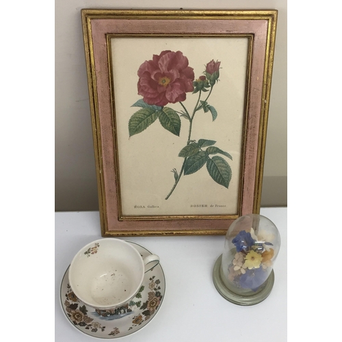 587 - A mixed lot of decorative floral items. To include a Wedgwood cup & saucer (pattern TKD), a captive ... 