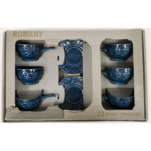 605 - A boxed set of six soup bowls & matching saucers, in ocean blue. Damage to one bowl.