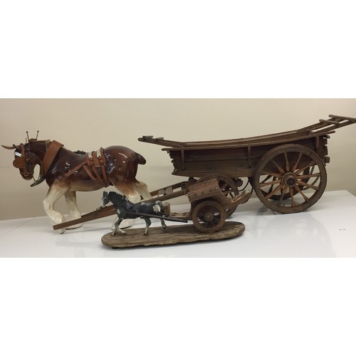 678 - A vintage, handmade in England, ceramic shire horse & 4-wheel hay cart (H23cm L80cm), together with ... 