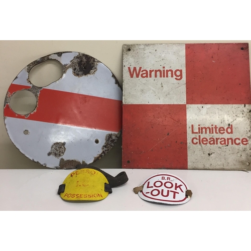 641 - A British Rail enamelled shunting disc & a warning sign, together with two enamelled signalman armba... 