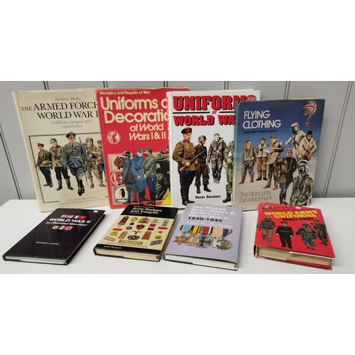 66 - A collection of eight military guidebooks. Subjects to include uniform, badges & insignia & medals o... 