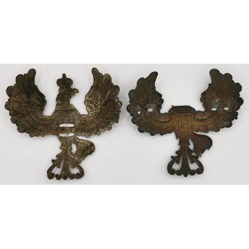 198 - A pair of Prussian Pickelhaube Helmet Plates.