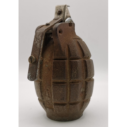 210 - An inert British WWI Mills Mk II grenade shell.