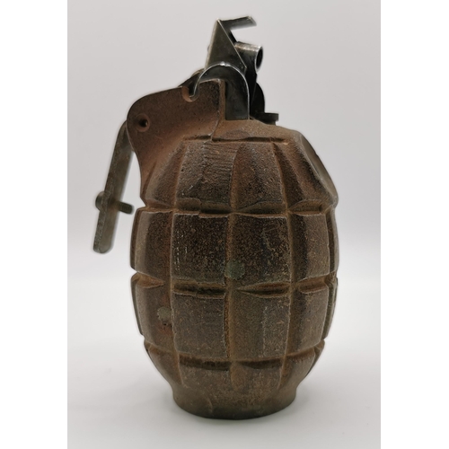 210 - An inert British WWI Mills Mk II grenade shell.