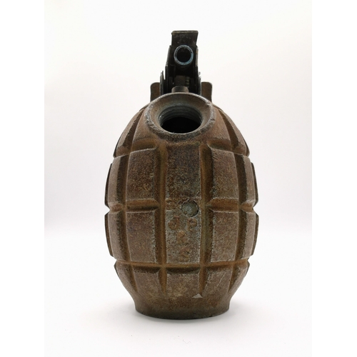 210 - An inert British WWI Mills Mk II grenade shell.