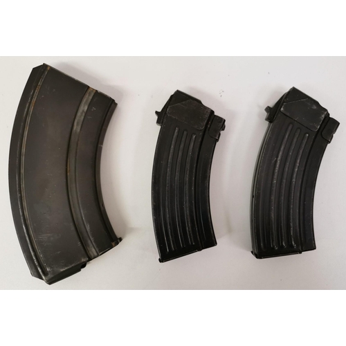 219 - A trio of WWII rifle magazines.