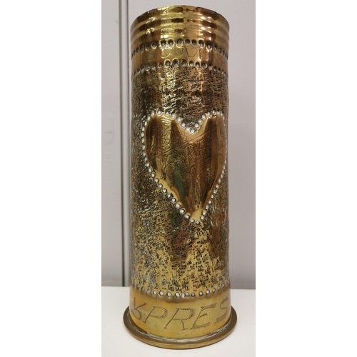 220 - Trench Art - A decorated WWI 1917 brass shell case, from the French battlefields, to commemorate the... 