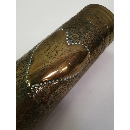 220 - Trench Art - A decorated WWI 1917 brass shell case, from the French battlefields, to commemorate the... 