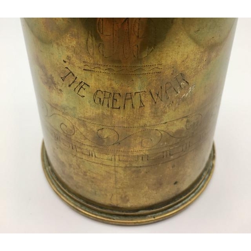 222 - Trench Art - A decorated WWI 1916 British brass shell case, to commemorate 'The Great War'. Length 2... 