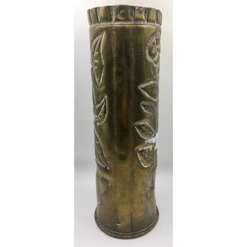 223 - Trench Art - A decorated WWI British brass shell case, engraved with a leafy-plant design. Length 29... 