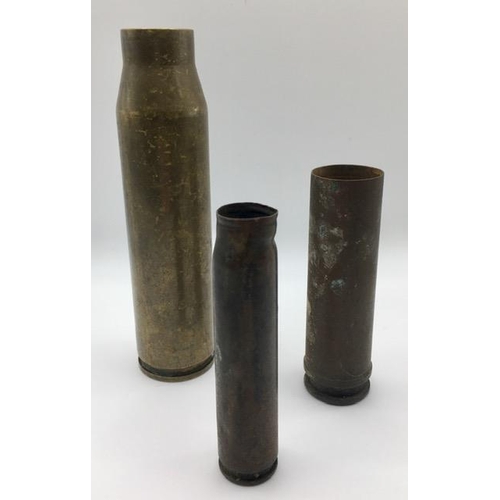 227 - A trio of spent brass shell cases.