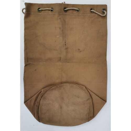 242 - A trio of military canvas kit bags.