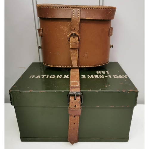 243 - A post WWII No.1 2 men-1 Day Rations Tin (empty), together with a vintage leather binoculars case (e... 