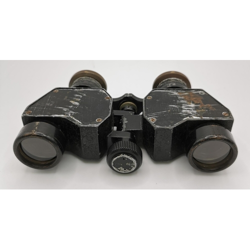 244 - A pair of early 20th century field binoculars (x6), by 'Negretti & Zambra - London'.