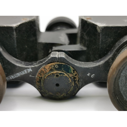 244 - A pair of early 20th century field binoculars (x6), by 'Negretti & Zambra - London'.