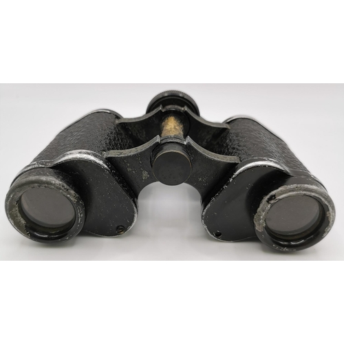 250 - A pair of early 20th century field binoculars, with leather case. Without identifiable maker/marking... 