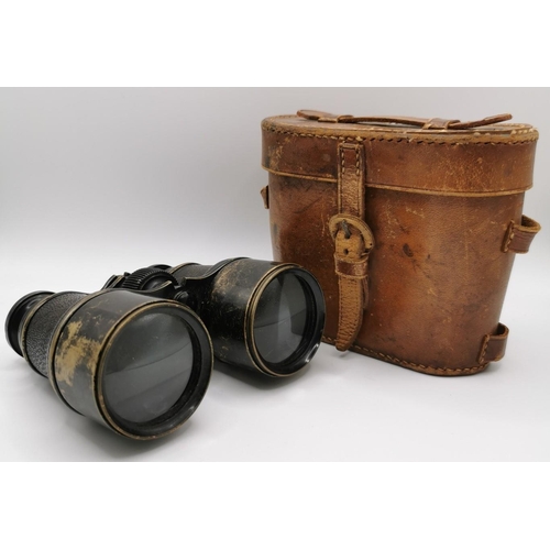 252 - A pair of WWI-era 'Ross of London' military binoculars, with original leather case.