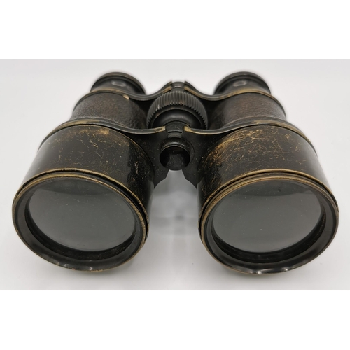 252 - A pair of WWI-era 'Ross of London' military binoculars, with original leather case.