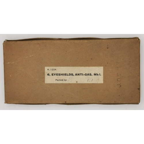 259 - A pair of WWII Anti-Gas Eyeshields, with original cardboard case. Manufactured 1938.