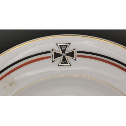 267 - A hand-painted, WWI-era, German Mess Plate. Features a freehand Imperial 1914 Cross. Diameter 24cm.