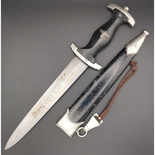 291 - A reproduction SS Dagger & matching Scabbard. Blade maker's mark' RZM M7/36' present. Blade length 2... 