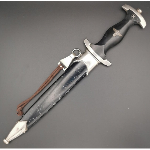 291 - A reproduction SS Dagger & matching Scabbard. Blade maker's mark' RZM M7/36' present. Blade length 2... 