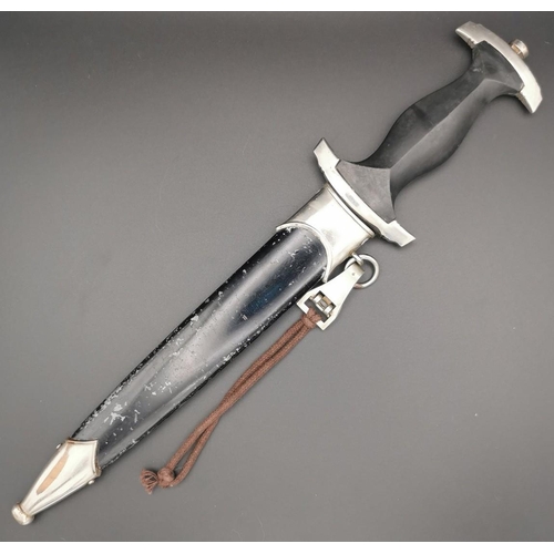 291 - A reproduction SS Dagger & matching Scabbard. Blade maker's mark' RZM M7/36' present. Blade length 2... 