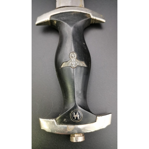 291 - A reproduction SS Dagger & matching Scabbard. Blade maker's mark' RZM M7/36' present. Blade length 2... 