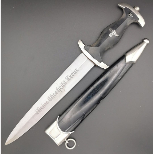 292 - A reproduction SS Dagger & matching Scabbard. Blade maker's mark' RZM M7/36' present. Blade length 2... 