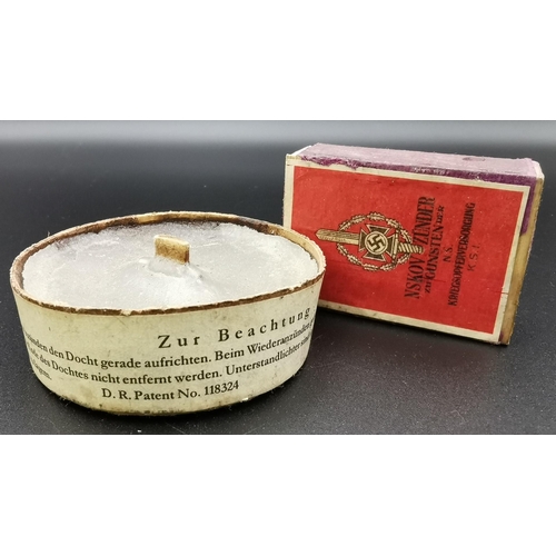 298 - A German WWI cast wax trench candle (dated 1914), together with a box of pre-WWII veteran's matches.