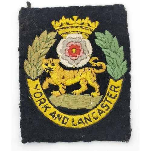 310 - A selection of five British Army cloth patches. To include Royal Engineers, York & Lancaster, Royal ... 