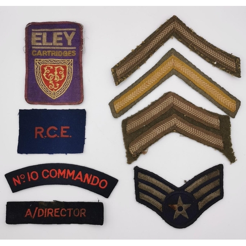 312 - A selection of British/Canadian/US cloth patches. To include chevrons, No.10 Commando shoulder, Roya... 